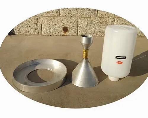 Essai de densité sur site par cône de sable à Belfort